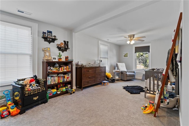 game room featuring ceiling fan and carpet flooring