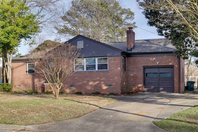 view of property exterior with a garage and a yard