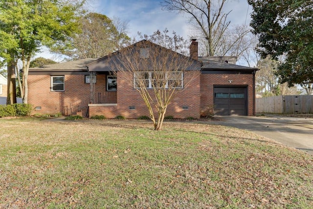 view of front facade with a garage and a front yard