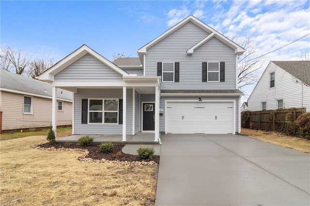 view of front property with a garage and covered porch