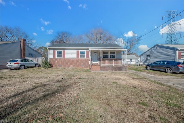 view of front of house with a porch and a front yard