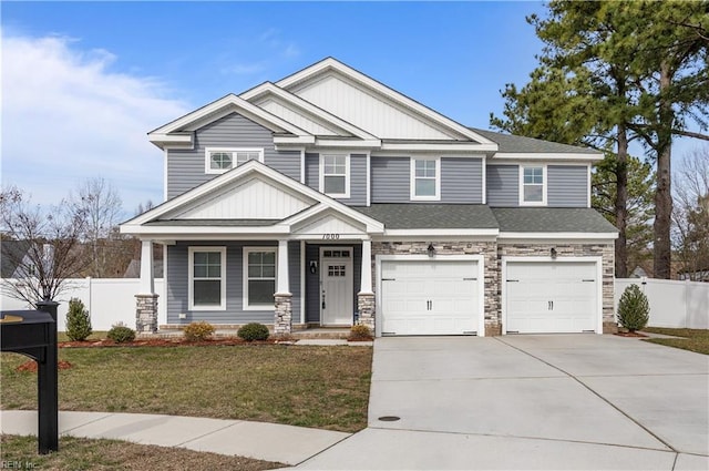 craftsman-style house with a front lawn and a garage