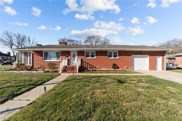 single story home featuring a garage and a front lawn