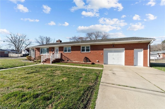 ranch-style home featuring a front lawn and a garage