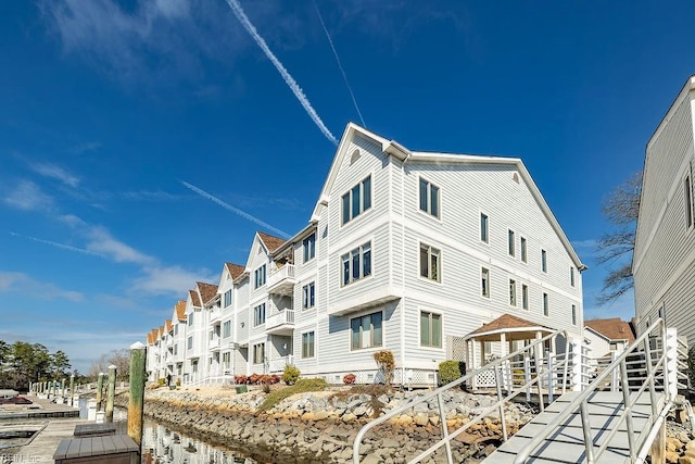 view of building exterior featuring a water view