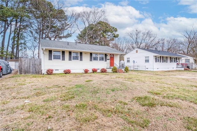 single story home with a front yard