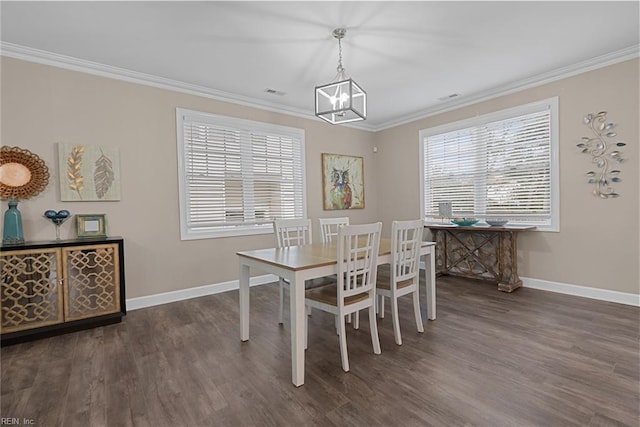 dining area with ornamental molding, dark wood finished floors, and baseboards