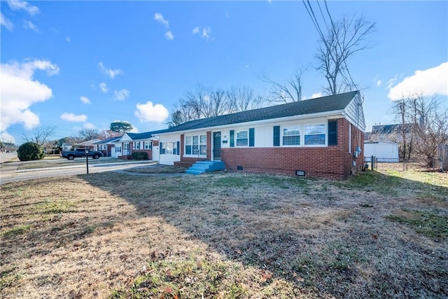 single story home with a front yard