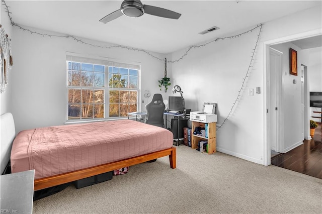 carpeted bedroom featuring ceiling fan