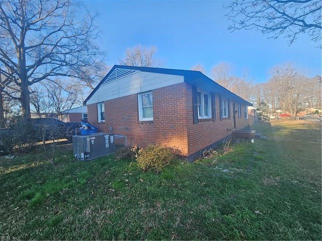 view of home's exterior featuring a yard