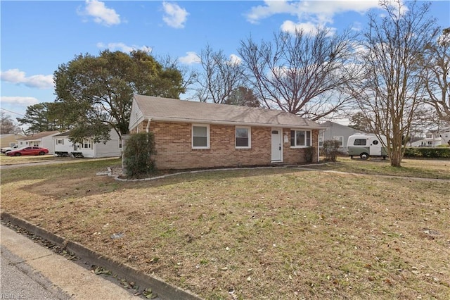 single story home with a front yard