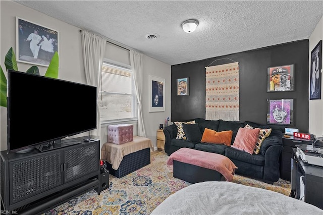 living room with a textured ceiling