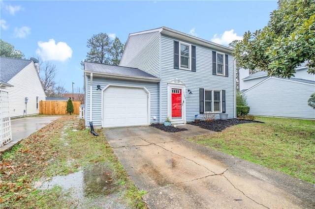 view of front of home with a garage and a front yard