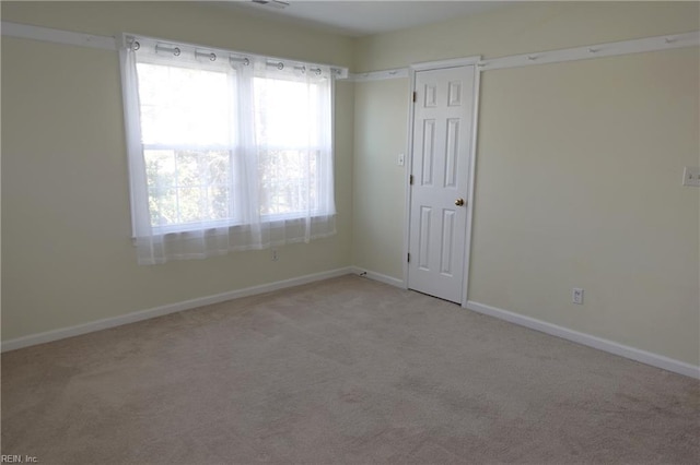 view of carpeted spare room