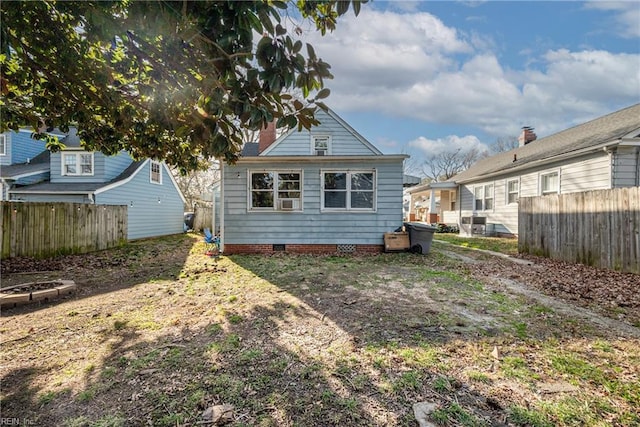 back of property featuring a fire pit