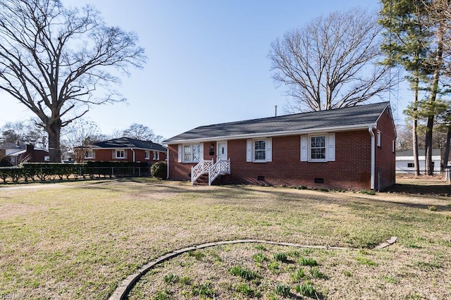 ranch-style house featuring a front lawn