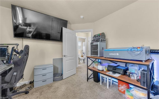 home office with carpet flooring