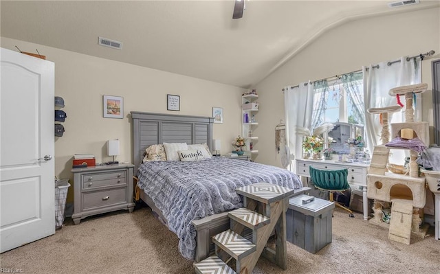 bedroom with lofted ceiling, carpet flooring, ceiling fan, and visible vents
