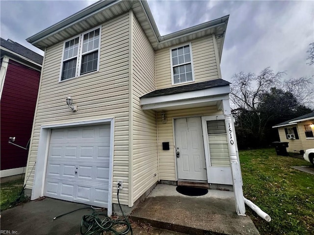 view of front of property featuring a garage