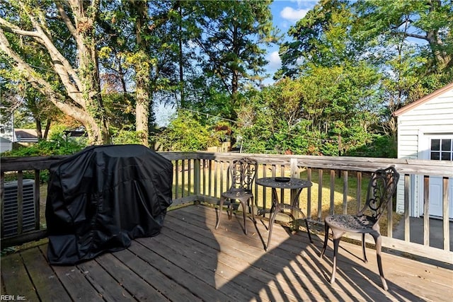 wooden deck featuring central AC