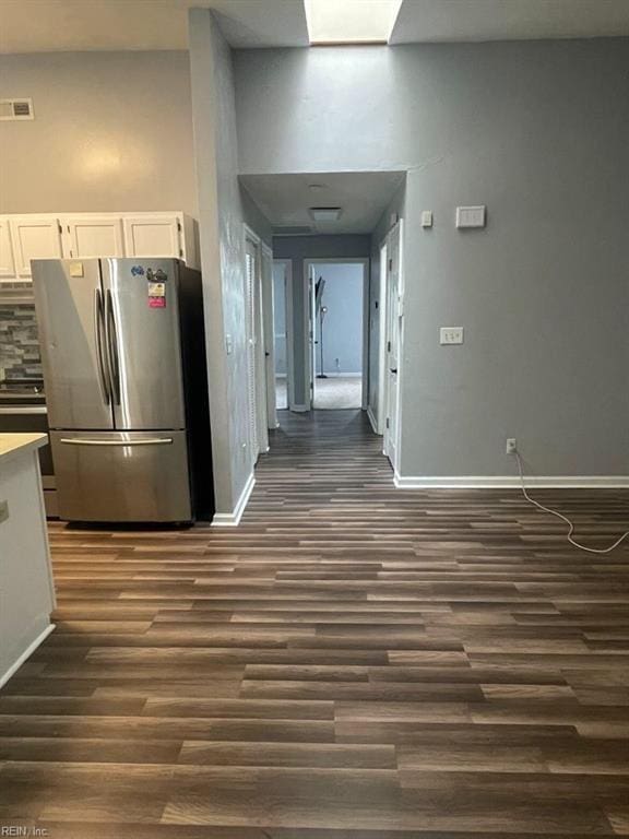 hall with dark hardwood / wood-style flooring