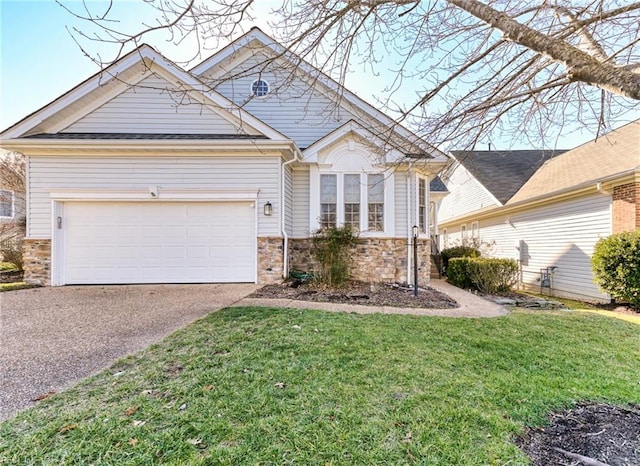 view of front facade featuring an attached garage, a front lawn, stone siding, and aphalt driveway