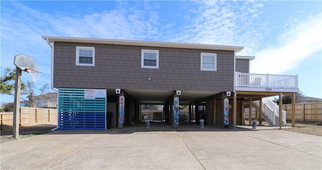 view of front of property featuring a carport