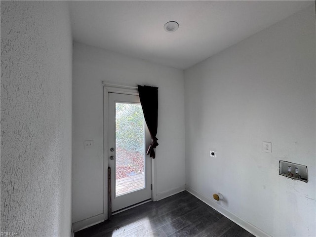 doorway to outside with dark hardwood / wood-style flooring