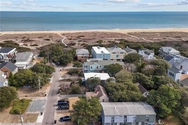 bird's eye view with a beach view, a residential view, and a water view