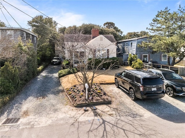 view of front of property featuring a chimney