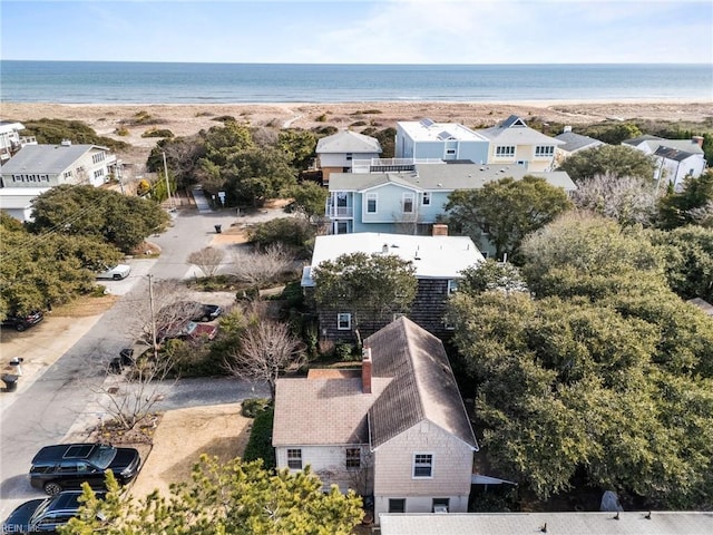 birds eye view of property featuring a residential view and a water view