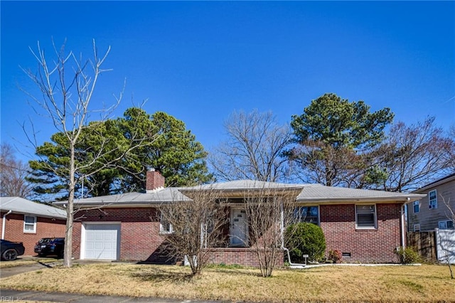 ranch-style house with a garage and a front yard