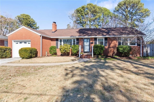 ranch-style home with a front lawn and a garage