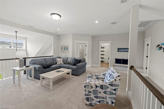 living room featuring light colored carpet