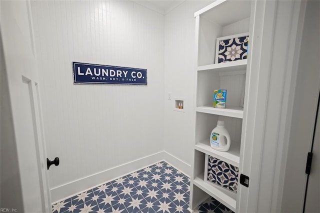 laundry room featuring built in shelves