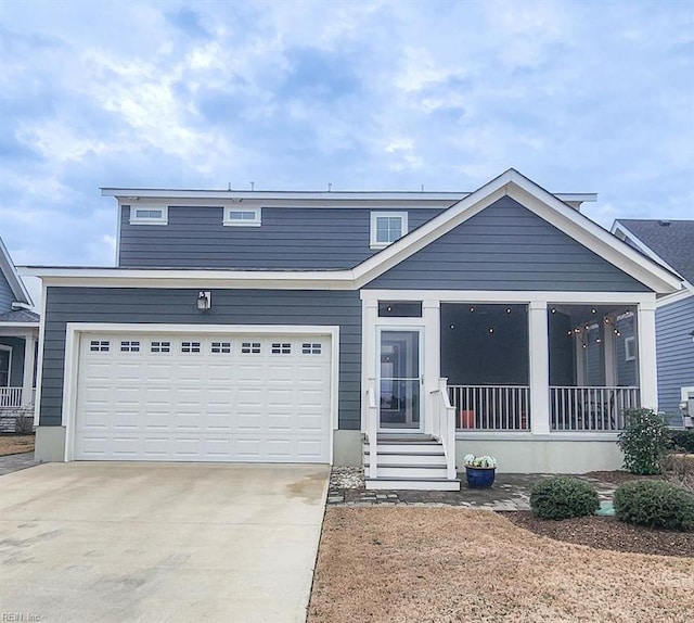 view of front of house with a garage and a porch