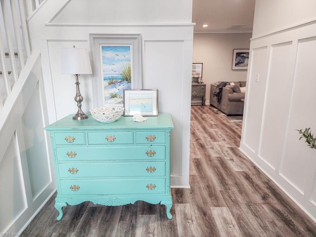 room details featuring ornamental molding and hardwood / wood-style flooring