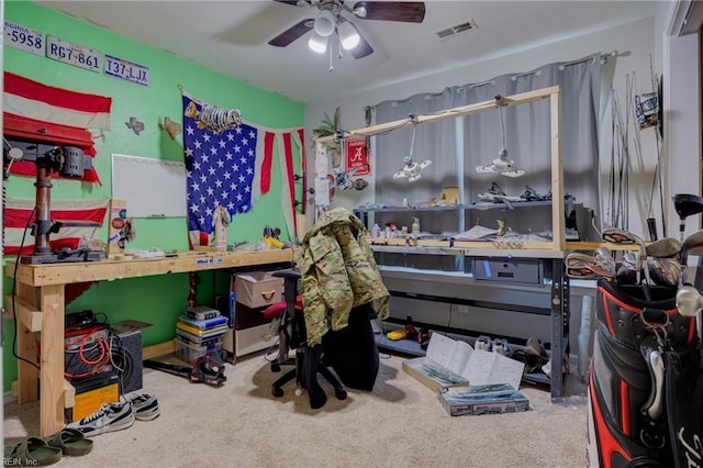 bedroom featuring a ceiling fan, visible vents, and carpet flooring