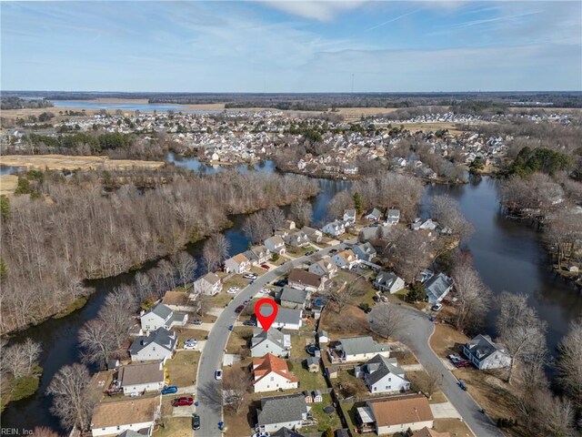 aerial view with a residential view and a water view