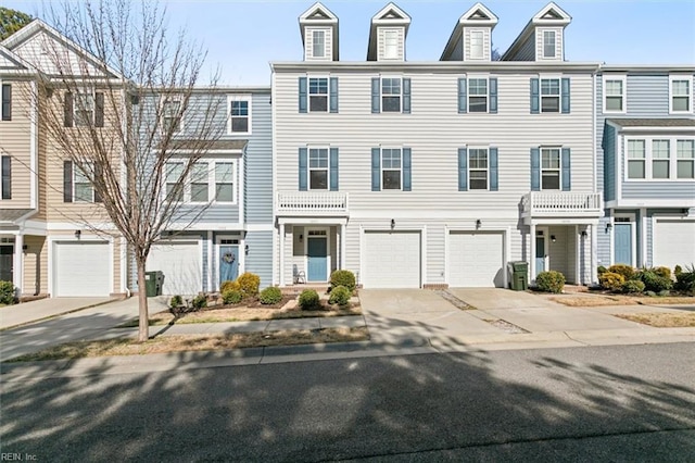 view of property with driveway and an attached garage