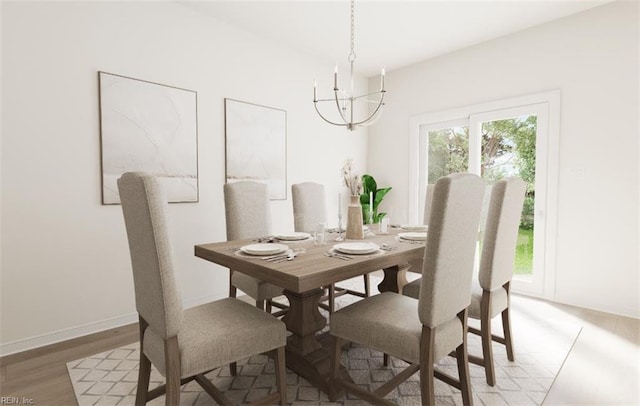 dining room with hardwood / wood-style flooring and a chandelier