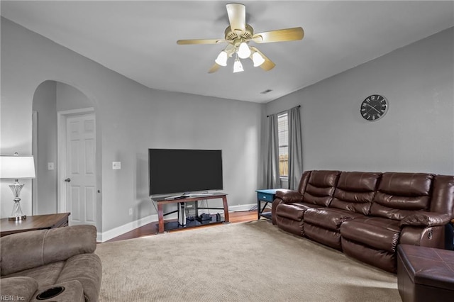 living room with ceiling fan