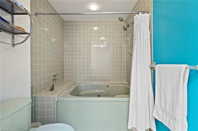 bathroom with toilet and shower / tub combo