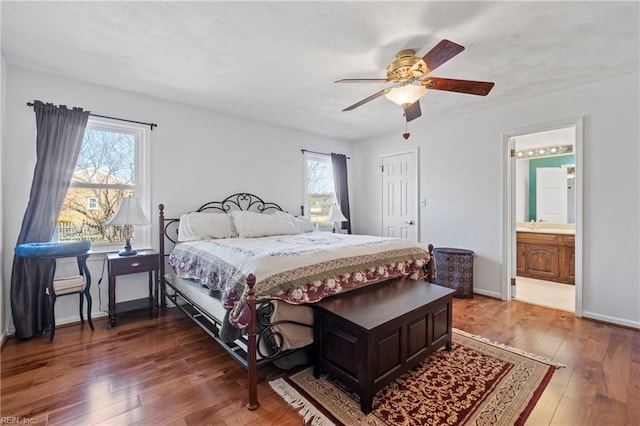 bedroom featuring ensuite bathroom, ceiling fan, and dark hardwood / wood-style flooring