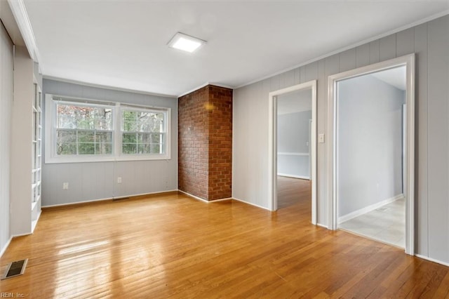 empty room with light wood-type flooring
