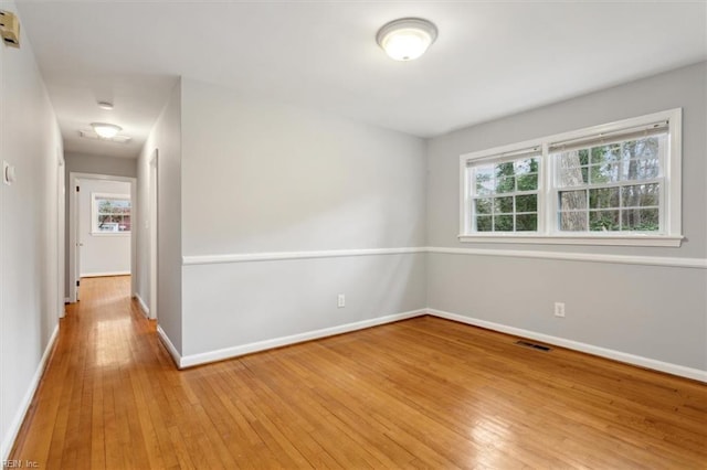 empty room featuring light hardwood / wood-style floors