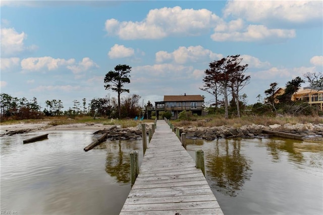 dock area with a water view