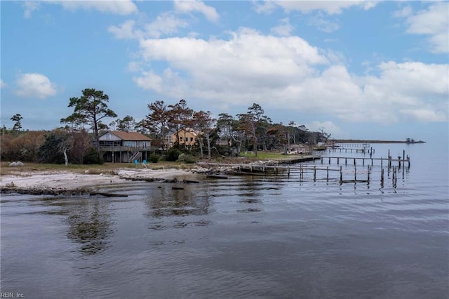 property view of water featuring a boat dock