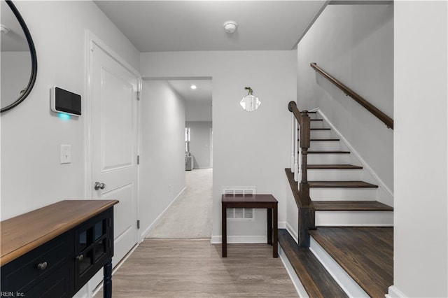 interior space with hardwood / wood-style floors