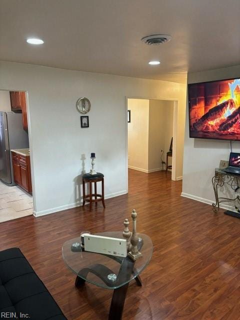 workout room featuring hardwood / wood-style floors